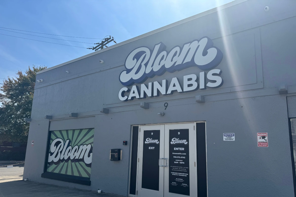 Bloom Cannabis Athens dispensary storefront exterior showing branded signage and entrance doors.