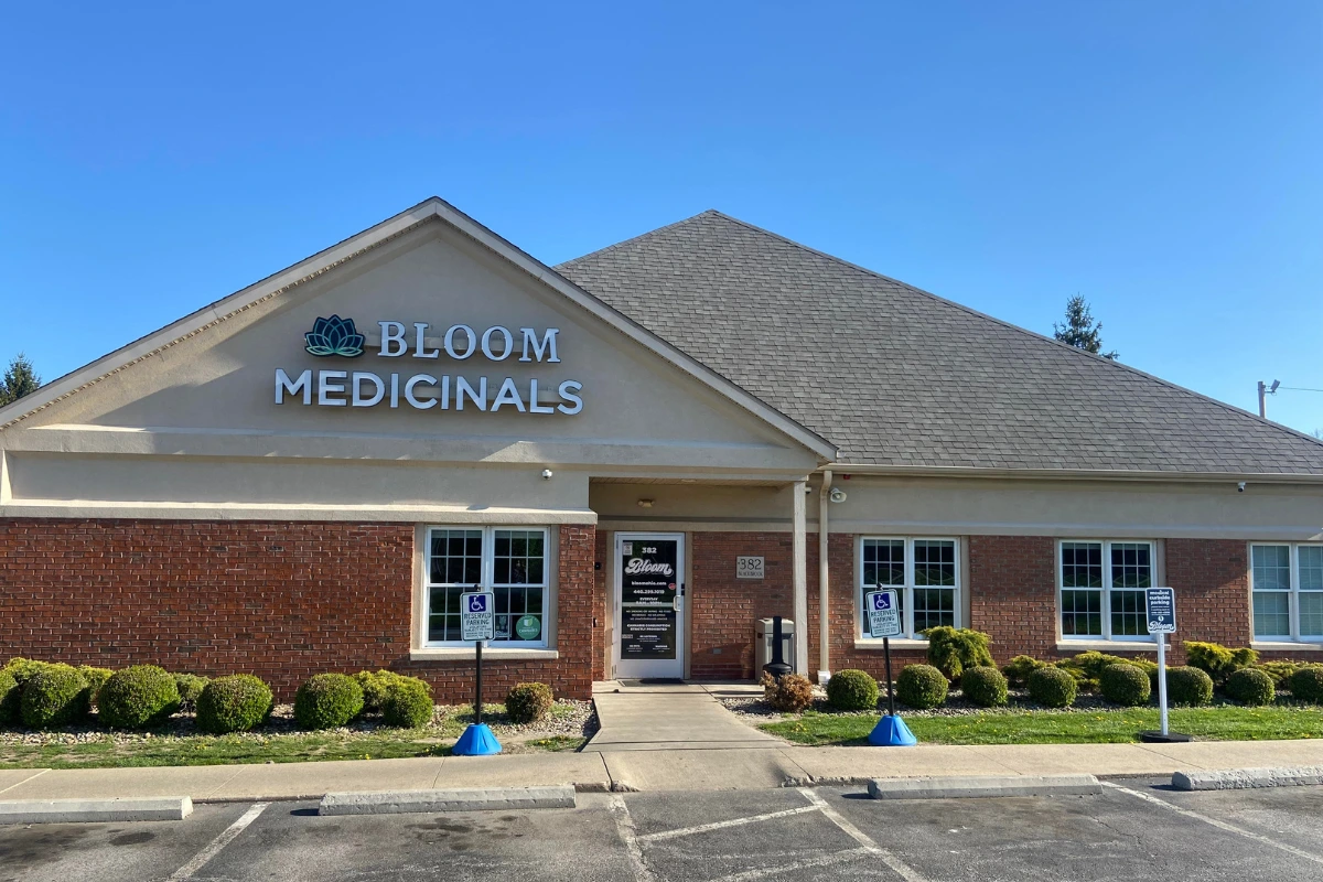 Bloom Painesville Township dispensary exterior with Bloom Medicinals signage and brick façade.