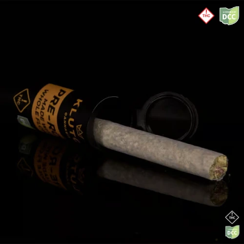 Klutch Lemon Slushee whole flower pre-roll beside its packaging tube, available at Bloom dispensaries in Ohio