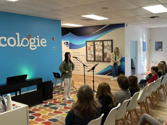 A singer performs at a Musicologie open mic event