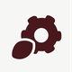 Dark brown gear and leaf icon on a light gray background, symbolizing eco-friendly technology or sustainable engineering.