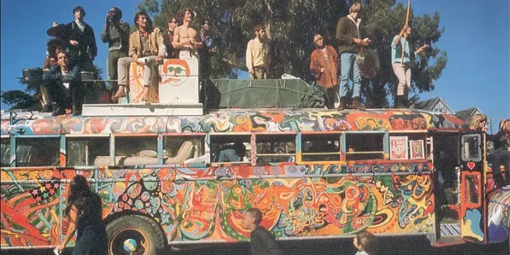 Members of the bands 'The Grateful Dead' and 'Jefferson Airplane' standing on the Roof of 'Furthur' Keseys and the Merry Pranksters Bus.