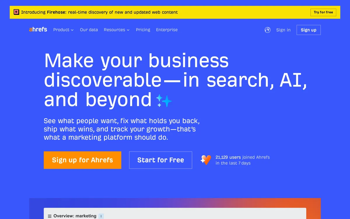 Ahrefs homepage hero with the headline 'Make your business discoverable, in search, AI, and beyond'