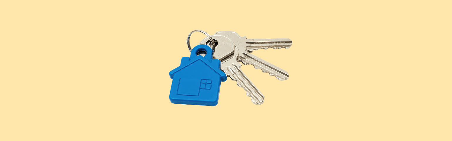 Keyring on light yellow background