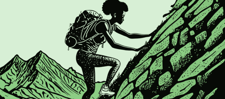 Woman backpacking up mountain