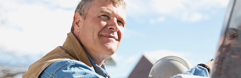 Man slightly smiling