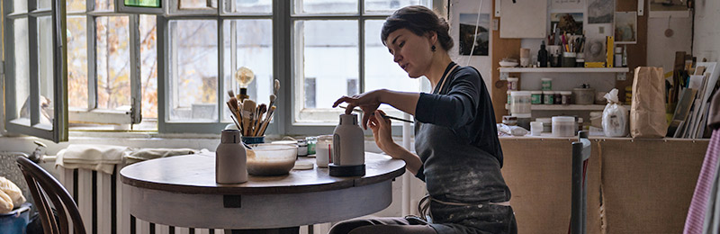 Woman working in art studio