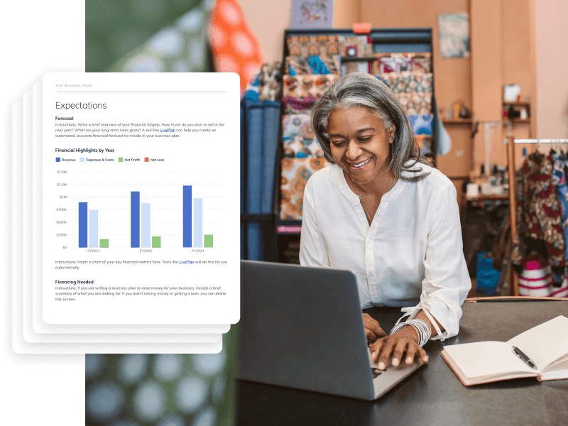 Woman working on a laptop looking at a template