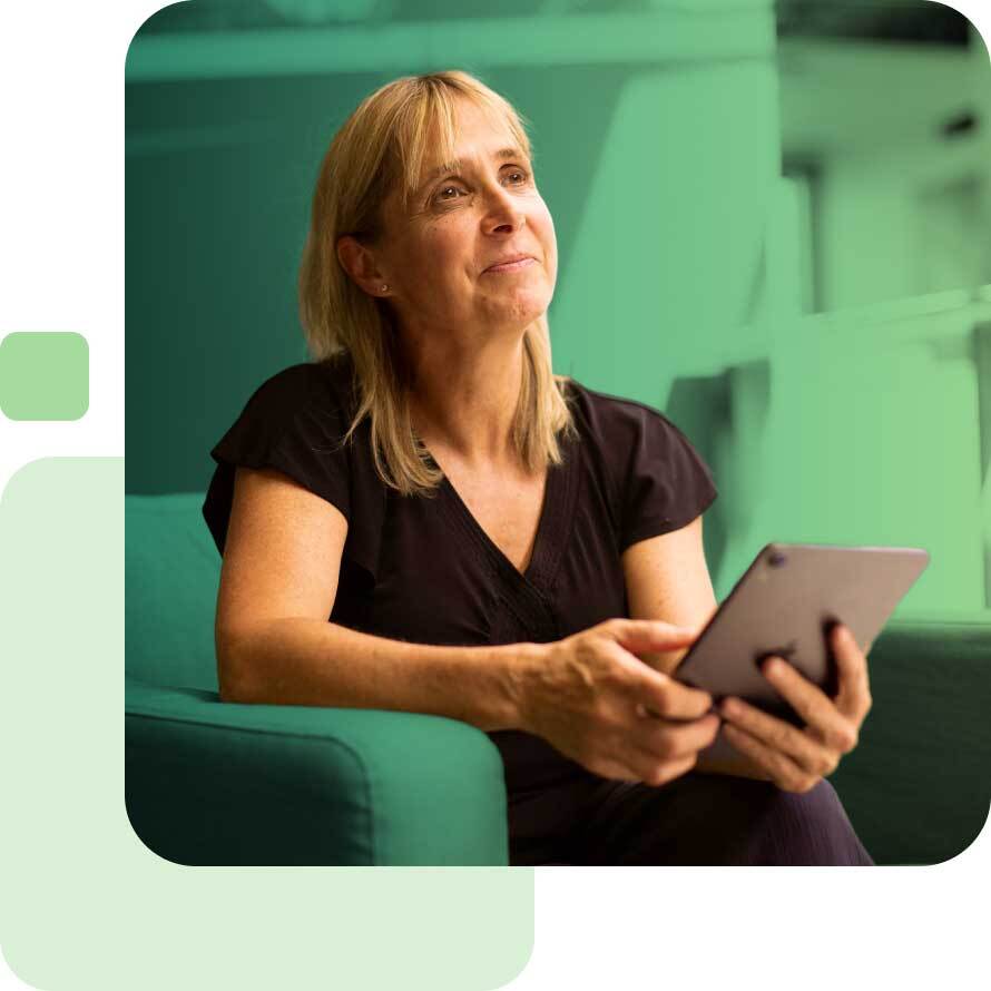 Sabrina holding a tablet