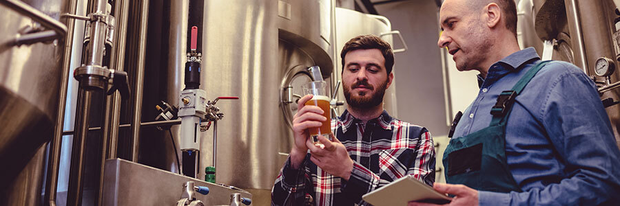 2 men in brewery
