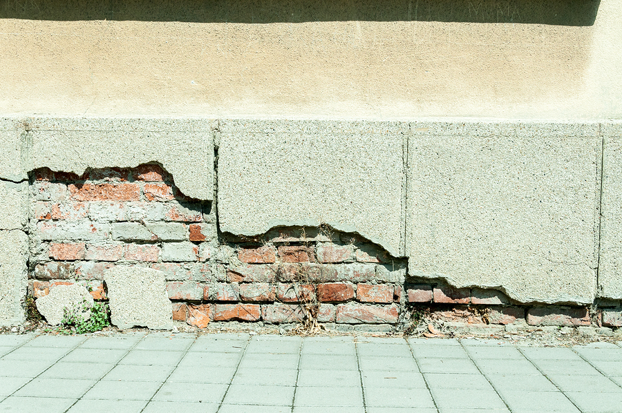 Foundation cracked; business risk concept Foundation cracked; business risk concept