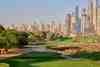 Golf with a view unlike any other - the Majlis Course at Emirates Golf Club, with Dubai's extraordinary skyline rising behind the 18th green.