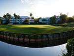 This classic country-club style course winds through pastel villas, pine forests, palmettos and sparkling lakes.