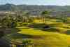 A dramatic downhill hole at Abama Golf Resort, Tenerife, with the Atlantic Ocean and volcanic landscape creating one of golf's most breathtaking settings.
