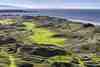The Dunluce Links at Royal Portrush, home of The Open Championship, stretching along the dramatic Antrim Coast.