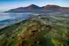 Royal County Down frames its bunkers against the Mountains of Mourne.
