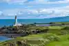 Turnberry's Ailsa Course features the iconic lighthouse backdrop on one of golf's most photographed holes.