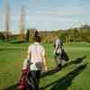 Two golfers approaching the green @ Golf Jamor, Portugal