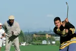 Adam Sandler as Happy Gilmore and Carl Weathers as Chubbs Peterson during a golf scene in Happy Gilmore