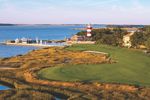 The famous lighthouse frames the strategic 18th hole at Harbour Town Golf Links.