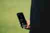 Hole19 app displaying a course map with GPS distances on a smartphone