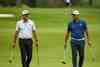 Two golfers walking the fairway together during a social round