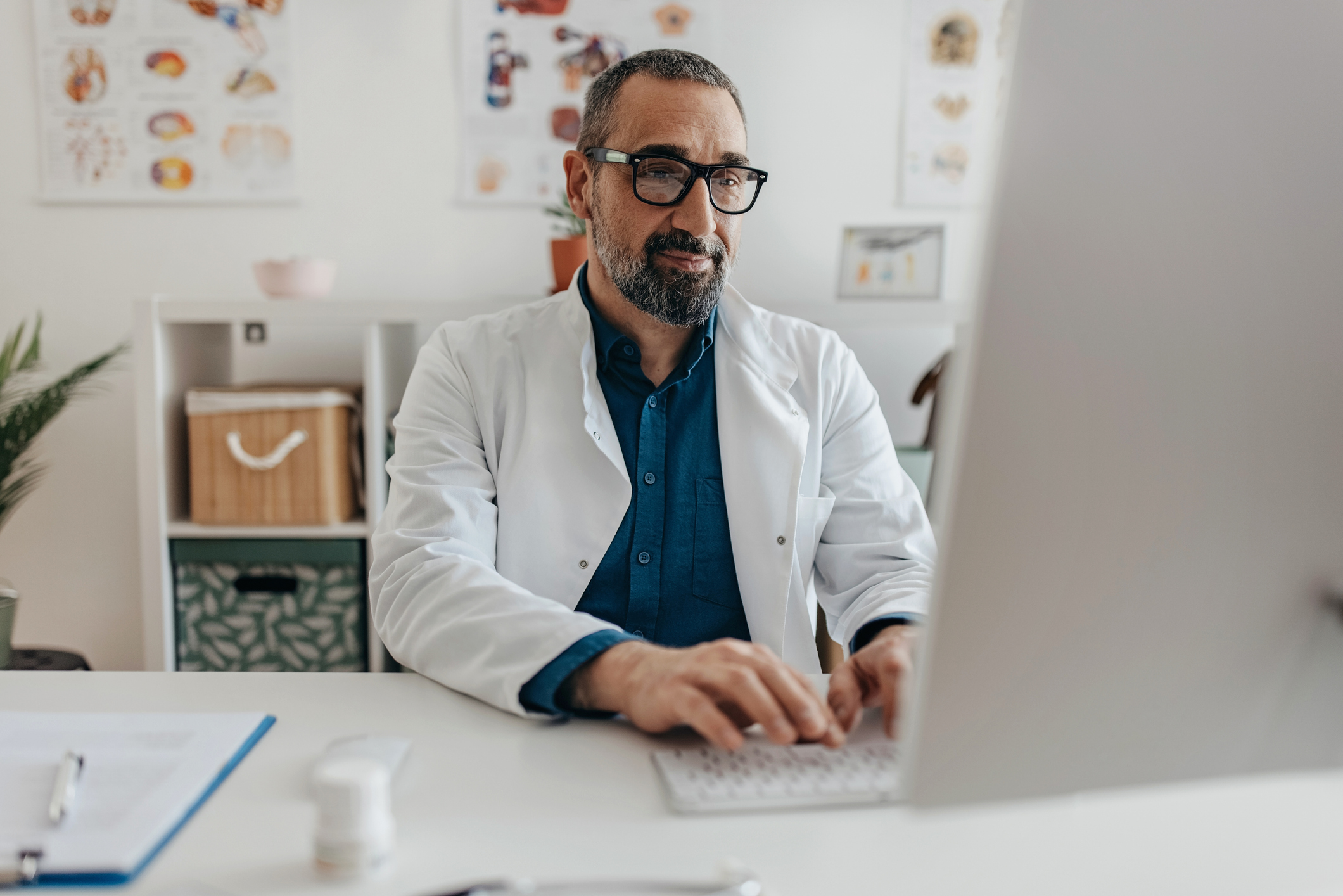 Physician using computer