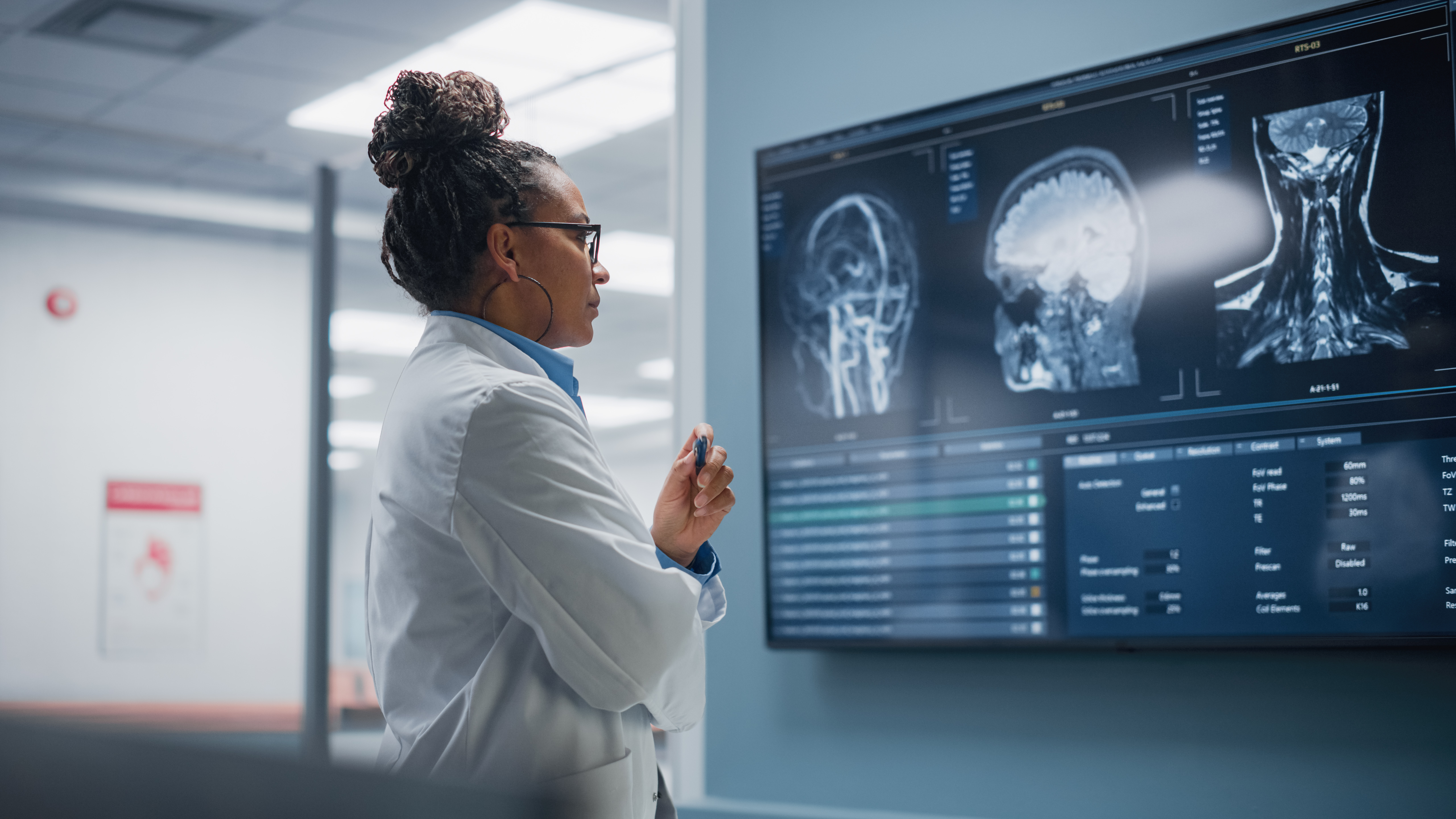 Neurologist analysing brain scans