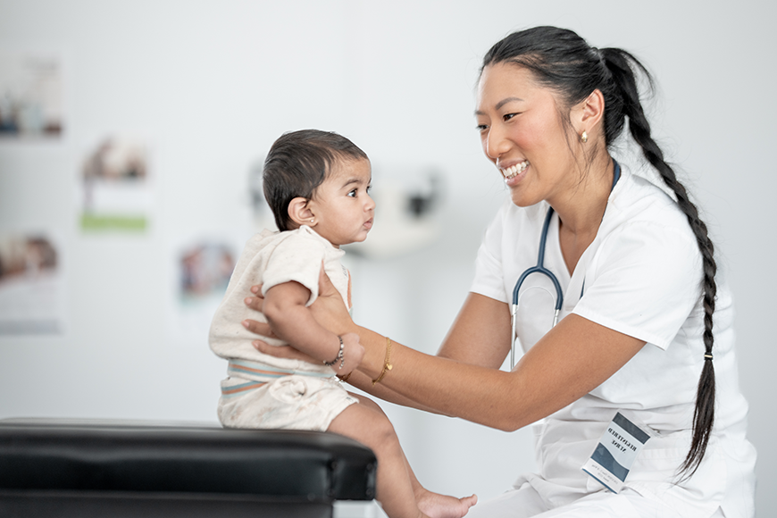 Pediatrician with baby