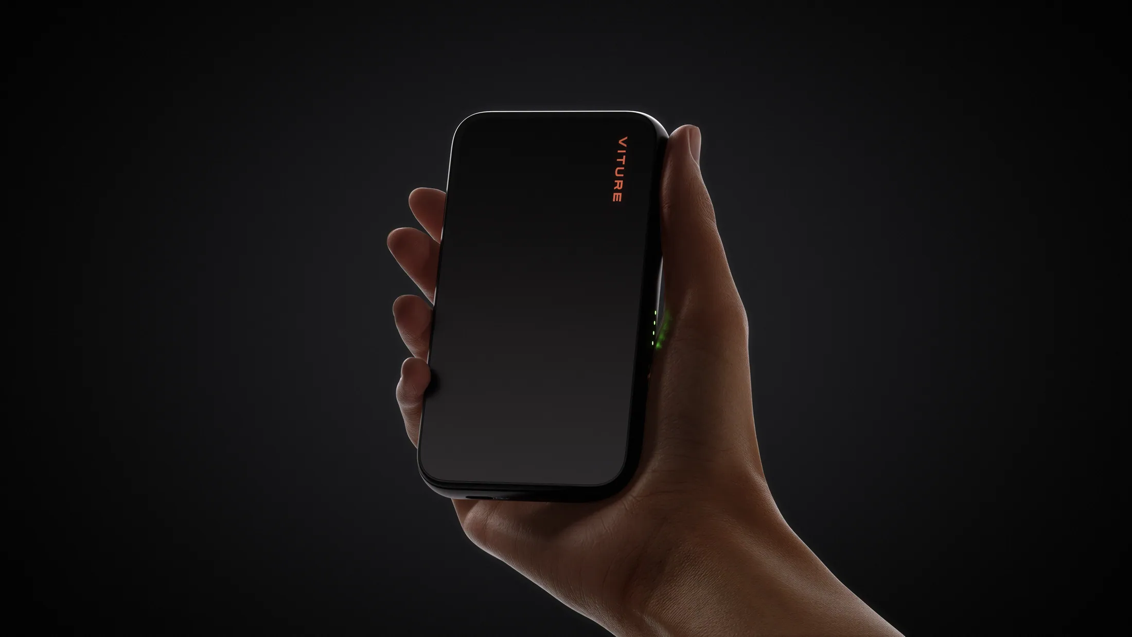 Hand holding the VITURE Mobile Dock Mini