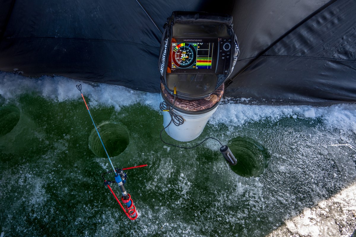 Jet ski in a wave near a footrest and rope, viewed from above inside a Montana inflatable shelter