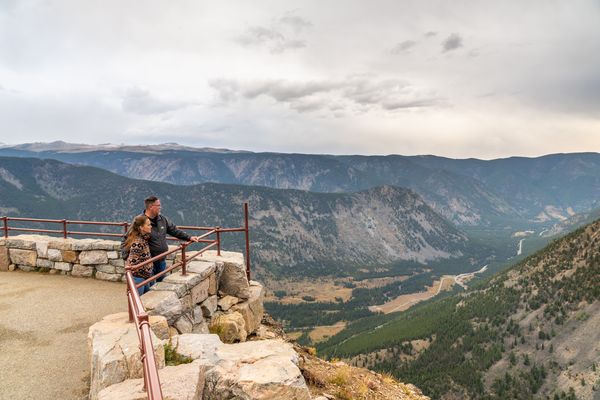 Couple looking at landscape from overlook