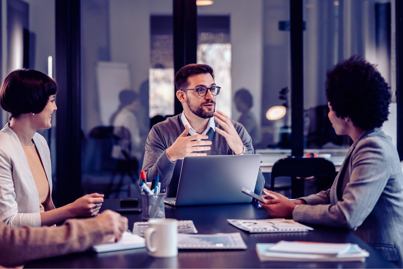 Partner teams collaborating in a shared workspace