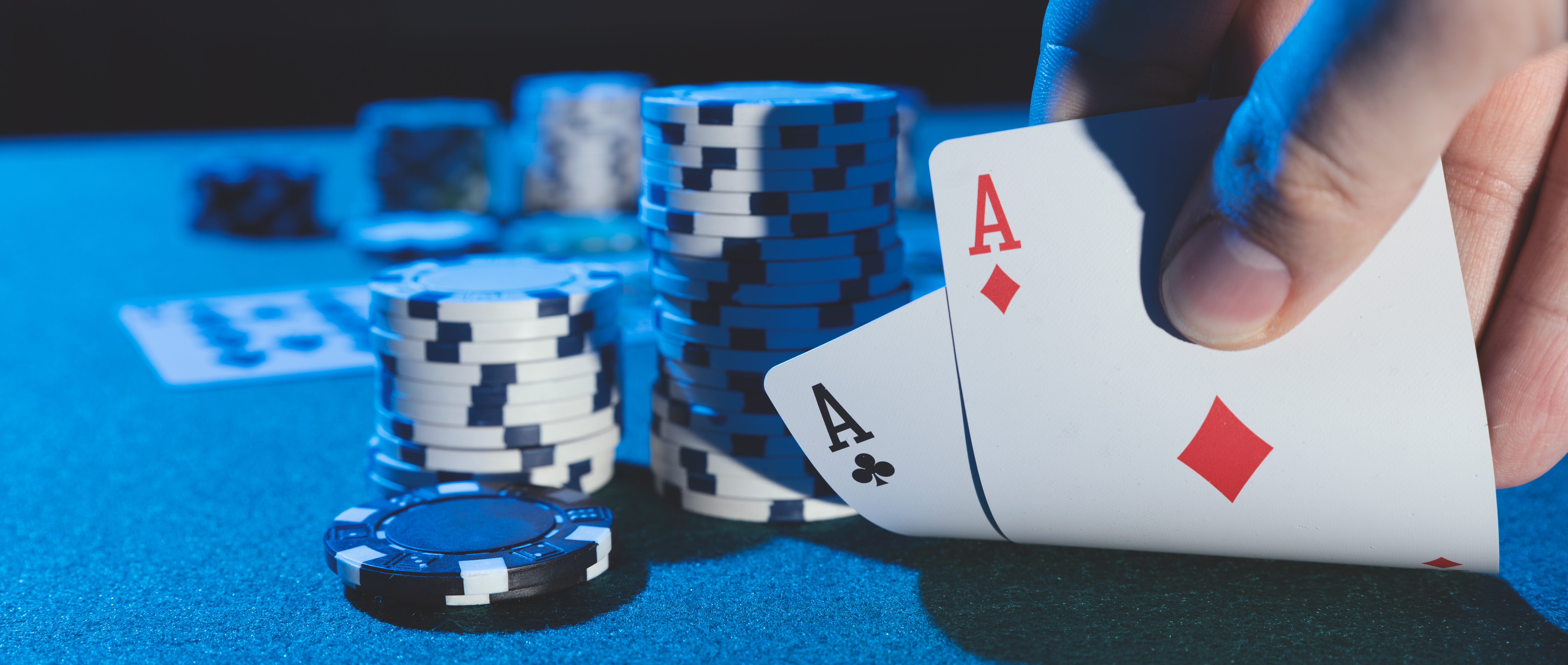 A close-up of someone’s poker hand to represent the best hands to win in poker.