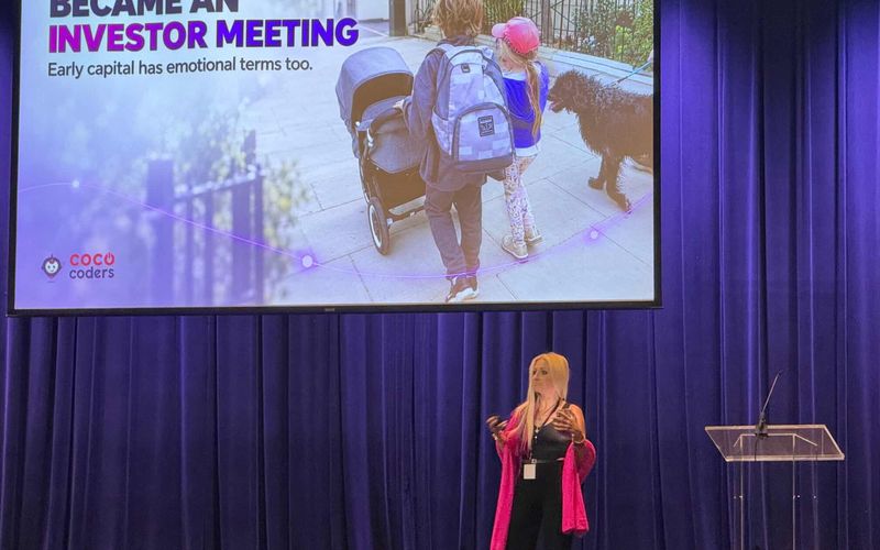 Photo of Elizabeth Tweedale on stage talking at Innovation Expo in Sioux Falls