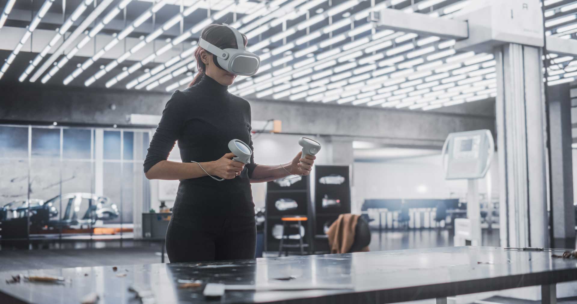 Female engineer uses a virtual reality headset in modern manufacturing environment