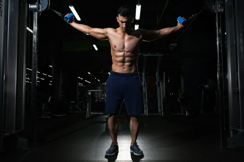 man in gym - Weighted Dips Strength Standards