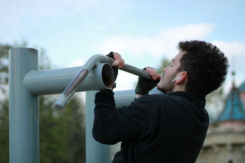 man working out - How Many Pull-Ups Can the Average Person Do