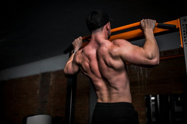 man working out - Pull-Up Strength Standards