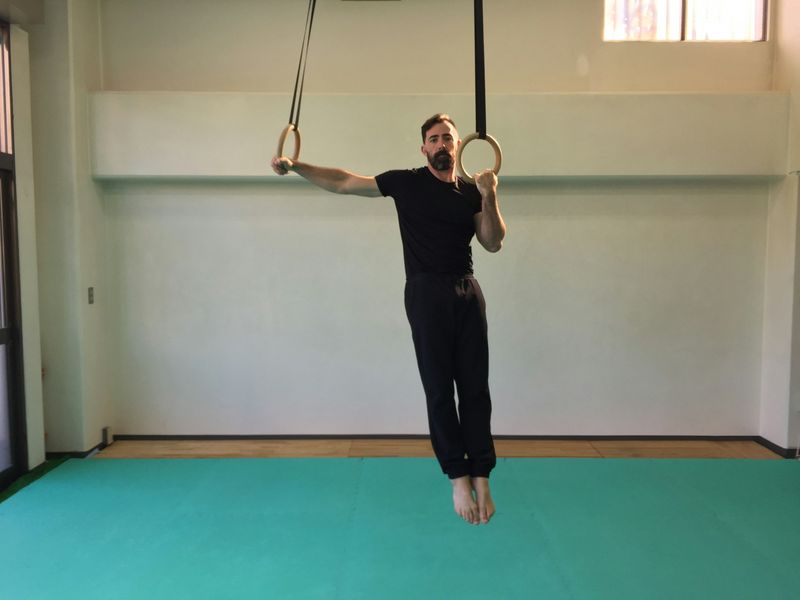 man doing workout - How Many Pull-Ups Can the Average Person Do