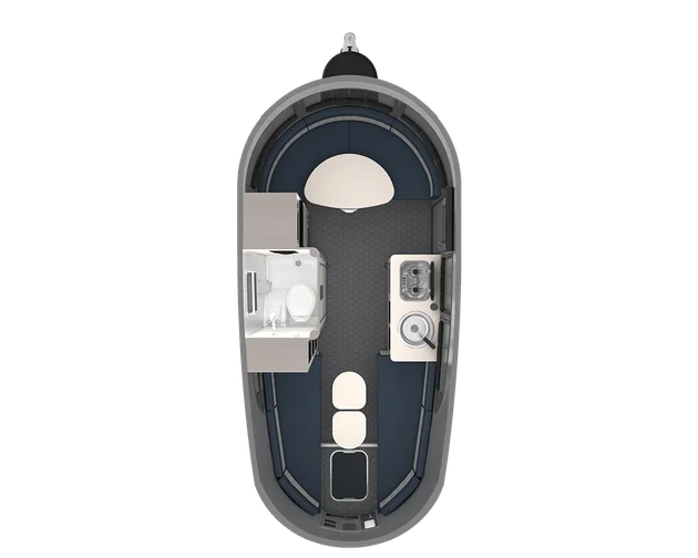 Top view of a compact boat interior featuring seating, a small kitchen area with a sink and stove, and a bathroom with a toilet and sink.
