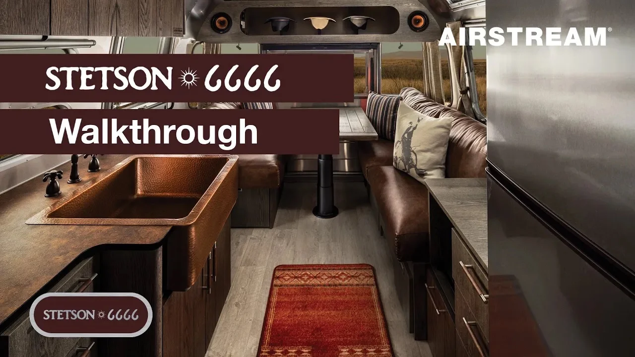 Interior view of an Airstream RV featuring a copper sink, brown leather seating, a patterned rug, and "Stetson 6666 Walkthrough" text overlay.