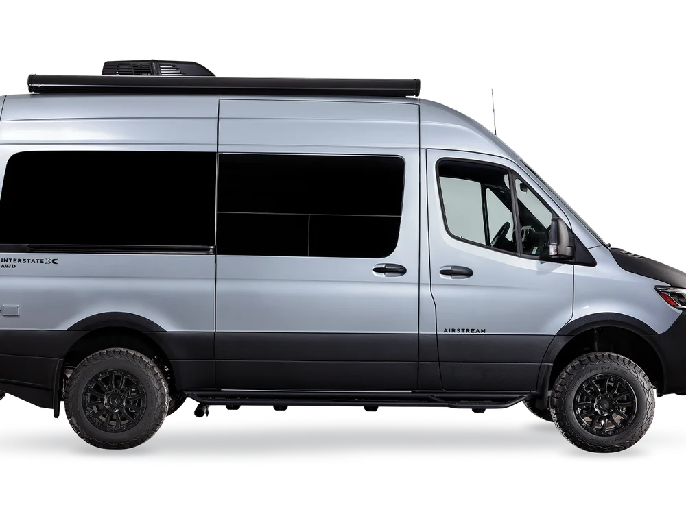 Interstate 19X touring coach, curbside studio view.