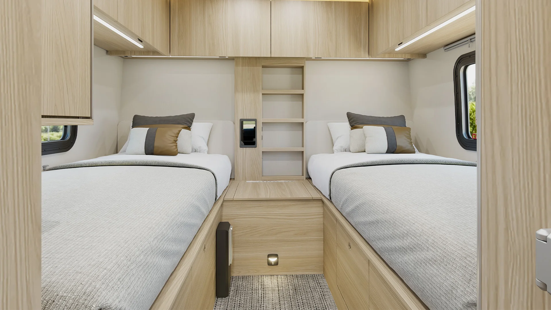 Modern camper bedroom with two twin beds, wood cabinets, built-in shelves, soft lighting, and a window view, featuring neutral bedding.