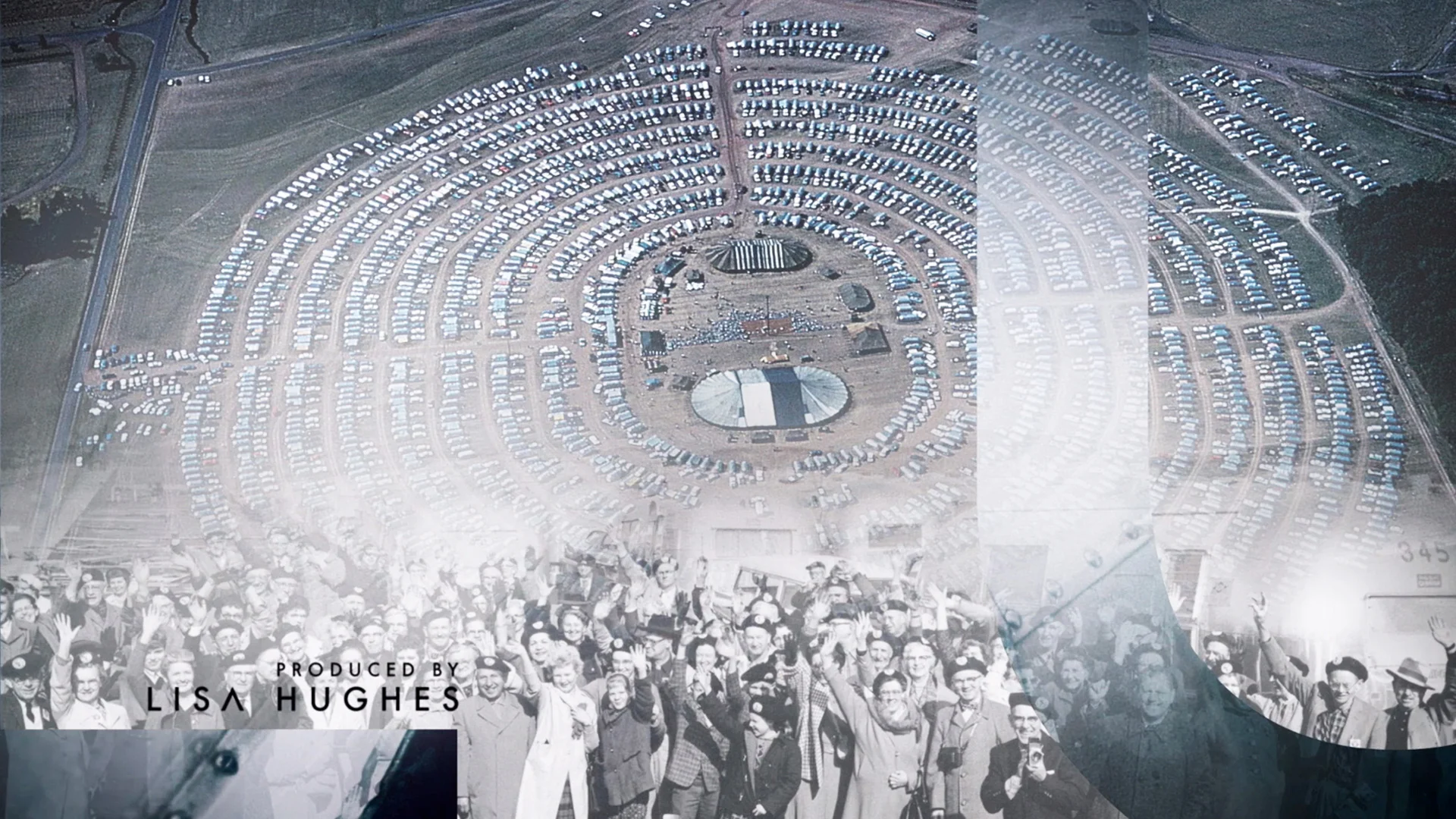 Aerial view of a large, organized car parking area in a circular pattern with a crowd of people at the bottom.