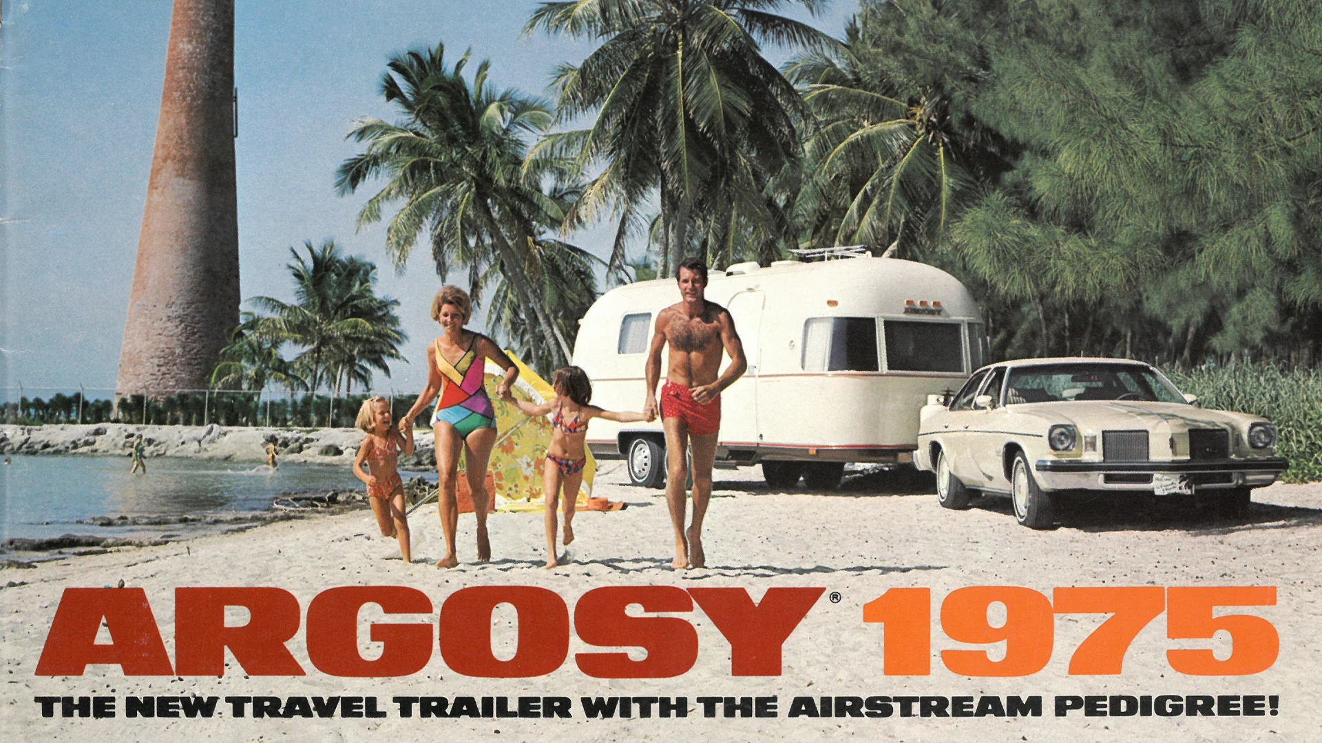 A family in swimsuits runs on a sandy beach near palm trees, with a white Airstream trailer and a vintage car parked beside them. Text reads: ARGOSY 1975: The new travel trailer with the Airstream pedigree!.