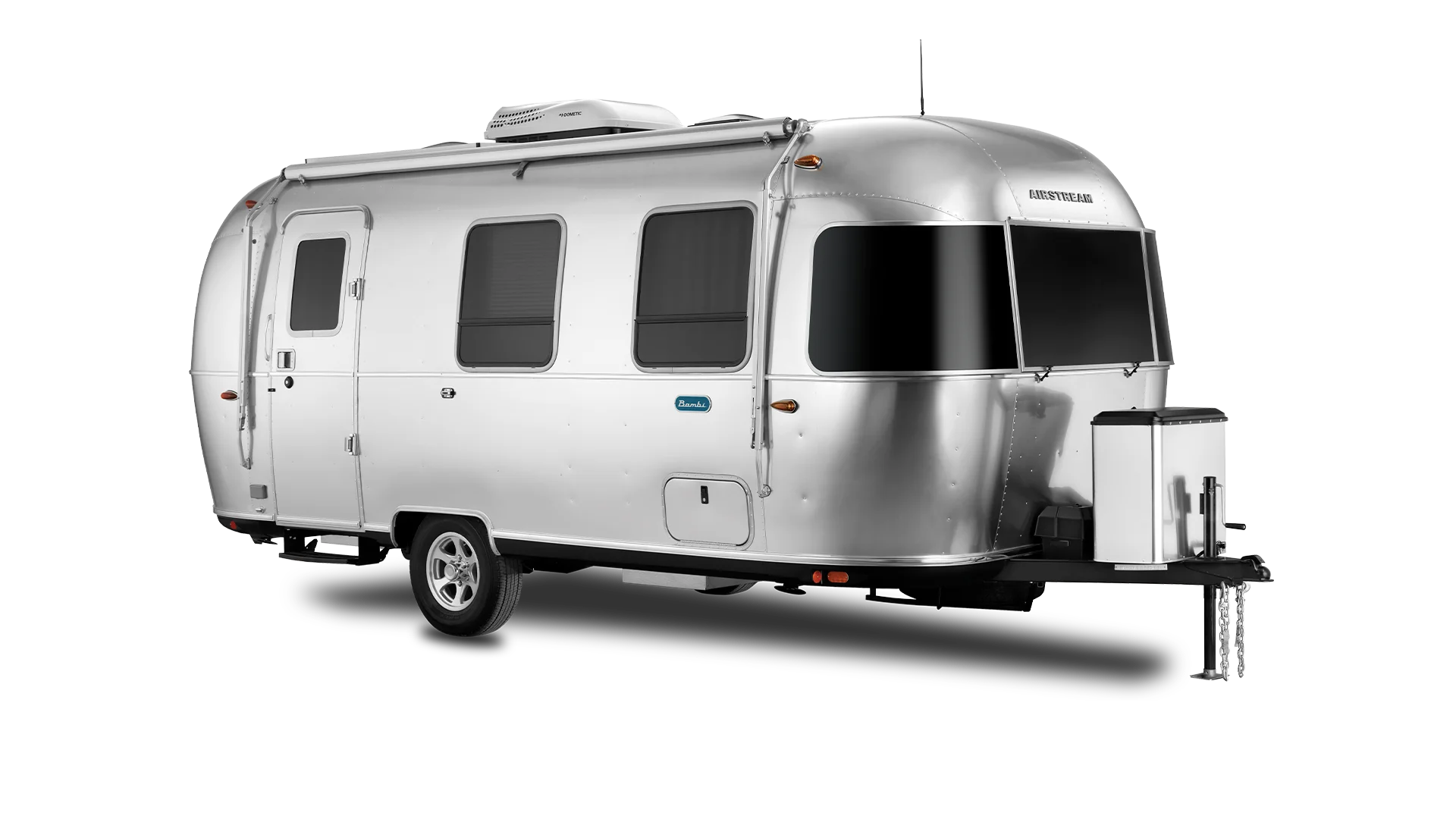 A modern, silver Airstream travel trailer with rounded edges, black-tinted windows, and a single axle, shown on a plain white background.