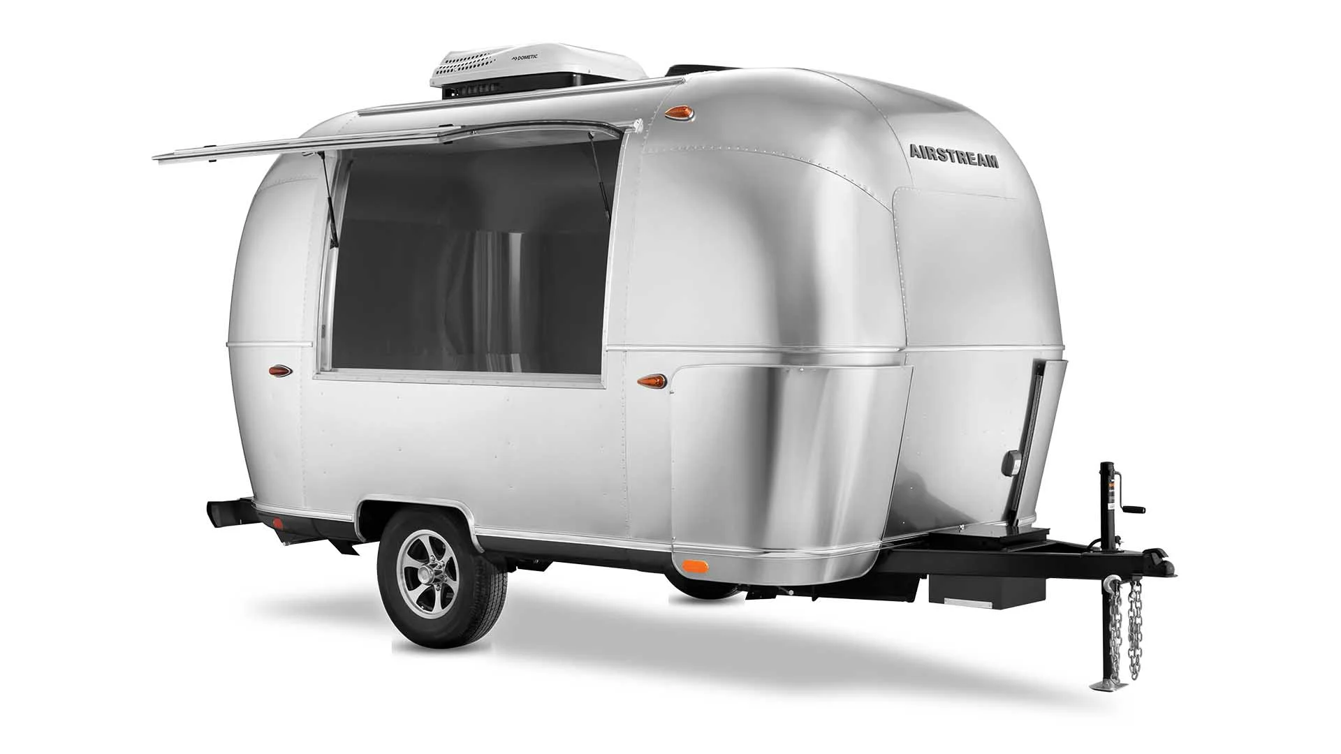 A sleek, silver Airstream 16-foot stock bar trailer with a curved design and an open serving window, set against a white background