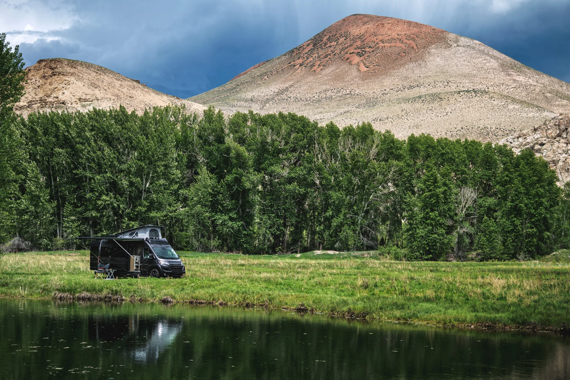The Airstream Rangeline Class B Motorhome parked in a field with mountains and a lake|airstream rangeline owner scott fortnum 1|airstream rangeline owner scott fortnum 2|airstream rangeline owner scott fortnum 3|airstream rangeline owner scott fortnum 4|airstream rangeline owner scott fortnum 5|airstream rangeline owner scott fortnum 6