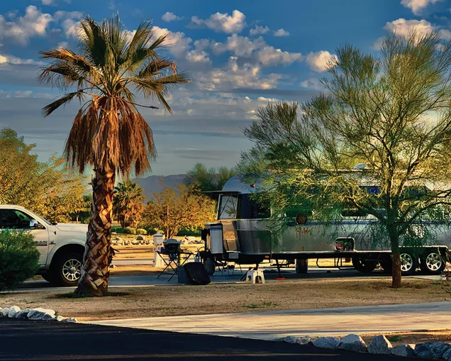 Airstream-Living-in-Beauty-Feature-Image|Airstream-Living-in-Beauty-Preview-Image|Airstream-Living-in-Beauty|Airstream-Living-in-Beauty-Baskets-2|Airstream-Living-in-Beauty-Baskets|Airstream-Living-in-Beauty-Police-Car|Airstream-Living-in-Beauty-Baskets-3|Airstream-Living-in-Beauty-Beach|Airstream-Living-in-Beauty-Desert|Airstream-Living-in-Beauty-Mountains|Airstream-Living-in-Beauty-on-the-beach|Airstream-Living-in-Beauty-Sunset|Airstream-Living-in-Beauty-Having-a-Drink|Airstream-Living-in-Beauty-At-House